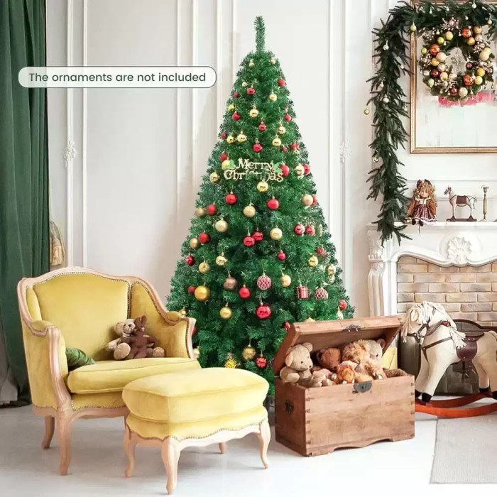 Artificial Christmas tree displayed with festive ornaments in a living room.