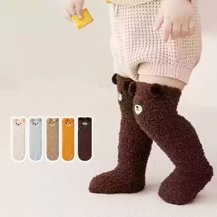 Brown kids winter socks with cute bear face design.