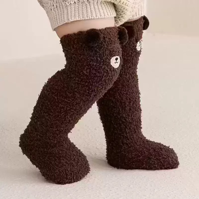 Dark brown kids winter bear socks with soft fluffy texture.