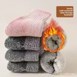 Thick winter wool socks with warm fleece lining for cold weather.