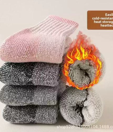 Thick winter wool socks with warm fleece lining for cold weather.