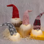 Festive Christmas gnome ornaments with red, grey and beige knitted hats