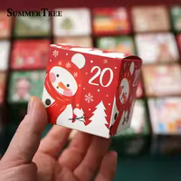 Numbered Advent Calendar Box Hand holding a numbered Christmas advent calendar gift box with festive print
